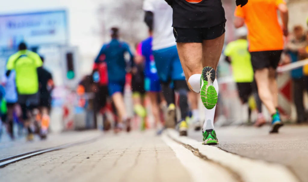 Shot of runner legs on street